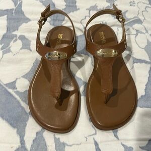 Women’s MK Plate Flat Thong Sandals